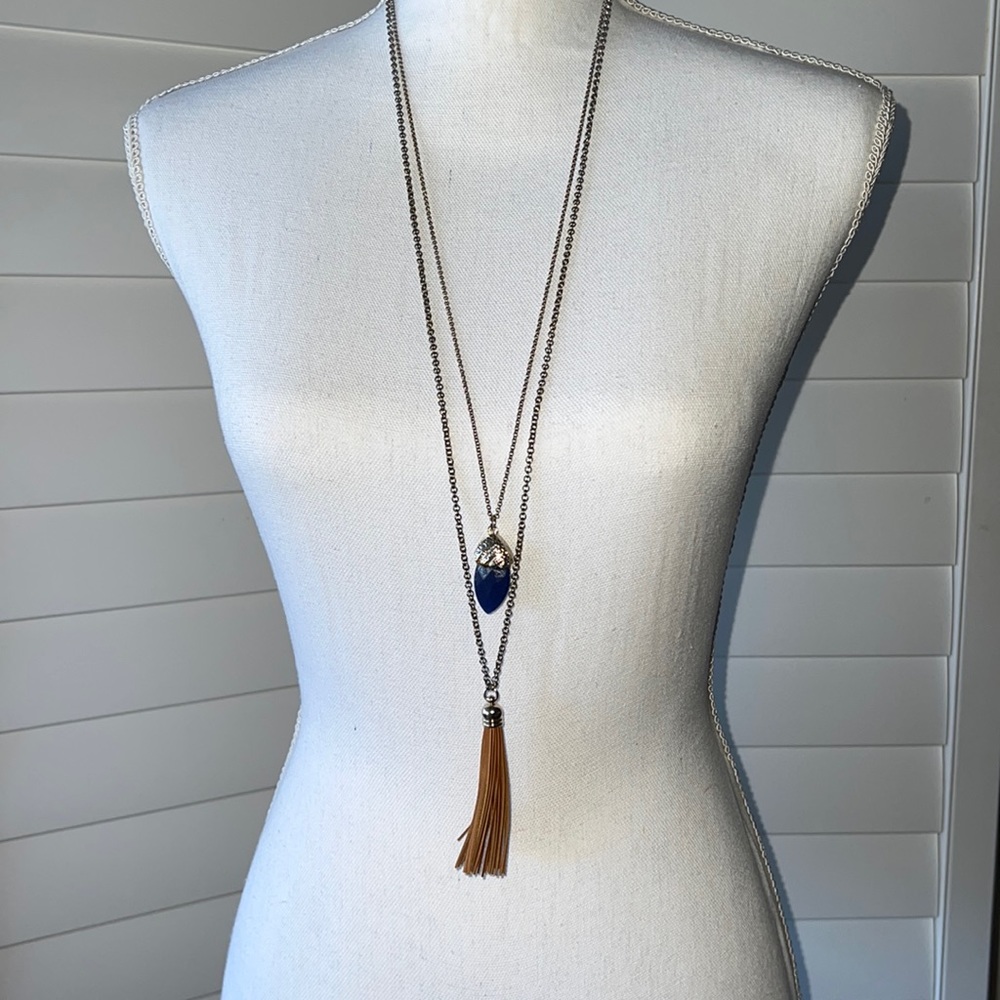 Double strand necklace 30” to 36” with blue faceted stone and leather tassel EUC